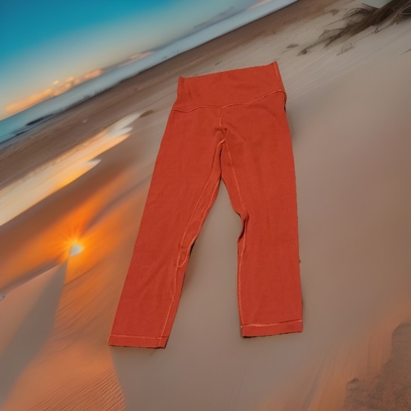 lululemon athletica Pants - Lululemon women's sz 2 fitted rust orange cropped athletic fitness leggings